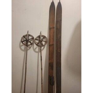 Antique Wooden Downhill skis and ski poles.  Perfect for  Cabin or lodge decor